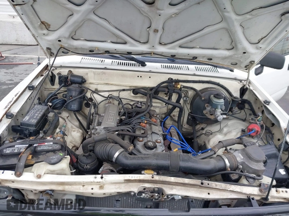 1992 Toyota Pickup z VIN 4TARN81A0NZ008256, wystawiony jako IAAI lot #41766264 z przebiegiem 278 220 mil mil oraz . Historia ofert i sprzedaży dostępna na DreamBid. Obrazek 10.