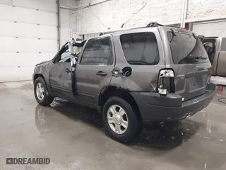 2004 Ford Escape XLT with VIN 1FMCU93174KB67570, listed as a IAAI auction lot 41228124 with 160,176 mi miles. Bid and sale history available at carsss.com. Image 3.