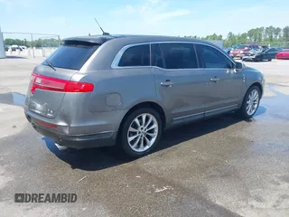 2010 Lincoln MKT EcoBoost with VIN 2LMHJ5AT7ABJ25423, listed as a IAAI auction lot 42048594 with 211,204 mi miles and . Bid and sale history available at DreamBid. Image 4.