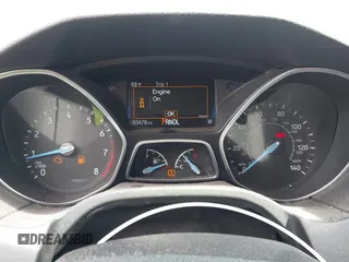 2017 Ford Focus SE z VIN 1FADP3F23HL313857, wystawiony jako IAAI lot #42181530 z przebiegiem 93 478 mil mil oraz . Historia ofert i sprzedaży dostępna na DreamBid. Obrazek 7.
