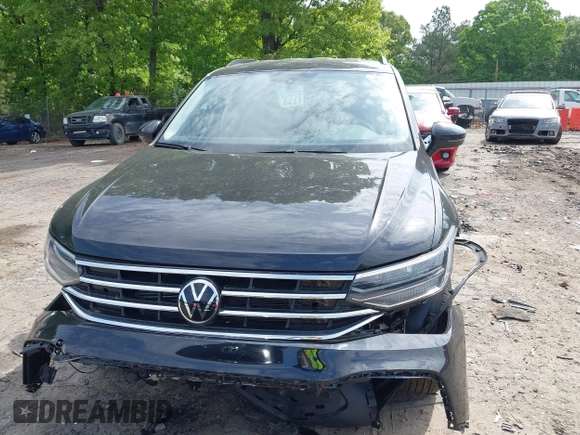 2023 Volkswagen Tiguan S with VIN 3VVRB7AX6PM108735, listed as a IAAI auction lot 42108217 with 13,279 mi miles and . Bid and sale history available at DreamBid. Image 12.
