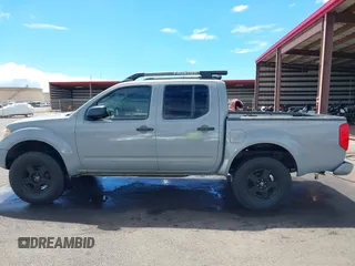 2007 Nissan Frontier LE with VIN 1N6AD07W17C438647, listed as a IAAI auction lot 40502289 with 153,553 mi miles and . Bid and sale history available at DreamBid. Image 14.