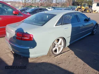 2009 Audi A8 L 4.2L with VIN WAUMV94E19N000826, listed as a IAAI auction lot 41692846 with 999,999 mi miles. Bid and sale history available at carsss.com. Image 4.