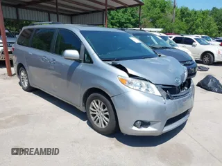 2015 Toyota Sienna XLE with VIN 5TDYK3DC0FS555636, listed as a IAAI auction lot 42099577 with 114,975 mi miles. Bid and sale history available at carsss.com. Image 1.