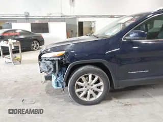 2015 Jeep Cherokee Limited with VIN 1C4PJMDB4FW775065, listed as a IAAI auction lot 42044247 with 125,131 mi miles and . Bid and sale history available at DreamBid. Image 19.