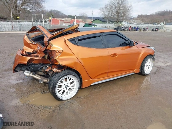 2015 Hyundai Veloster Turbo with VIN KMHTC6AE5FU240790, listed as a IAAI auction lot 41497795 with 180,601 mi miles. Bid and sale history available at carsss.com. Image 4.