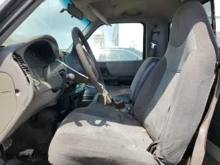 1999 Mazda B-Series 2WD Truck SX with VIN 4F4YR12C1XTM24843, listed as a Copart auction lot 46144364 with 346,188 mi miles and Salvage Title. Bid and sale history available at carsss.com. Image 7.
