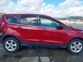 2016 Ford Escape SE with VIN 1FMCU9G9XGUA77208, listed as a IAAI auction lot 41666260 with 91,911 mi miles. Bid and sale history available at carsss.com. Image 13.