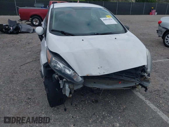 2019 Ford Fiesta SE z VIN 3FADP4EJ5KM132862, wystawiony jako IAAI lot #40893430 z przebiegiem 91 011 mil mil oraz . Historia ofert i sprzedaży dostępna na DreamBid. Obrazek 6.