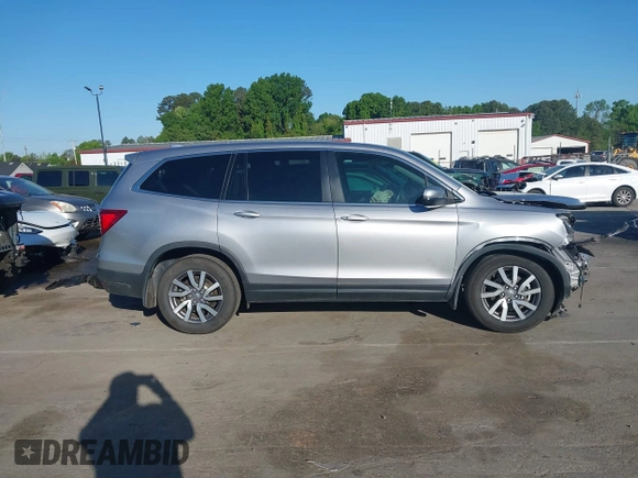 2020 Honda Pilot EX-L z VIN 5FNYF5H51LB016163, wystawiony jako IAAI lot #42030430 z przebiegiem 65 383 mil mil oraz . Historia ofert i sprzedaży dostępna na DreamBid. Obrazek 13.