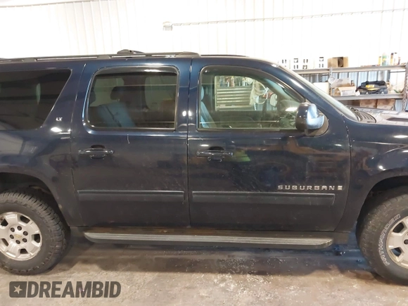 2009 Chevrolet Suburban LT w/1LT with VIN 1GNFK26319R272557, listed as a IAAI auction lot 42138238 with 223,599 mi miles. Bid and sale history available at carsss.com. Image 13.