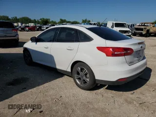 2017 Ford Focus SE with VIN 1FADP3FE8HL284169, listed as a Copart auction lot 61732695 with 70,443 mi miles and Salvage title. Bid and sale history available at DreamBid. Image 2.