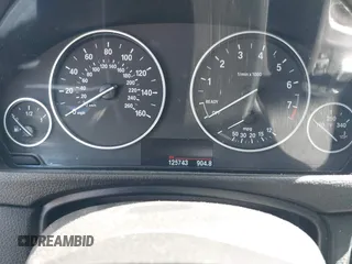 2014 BMW 3 Series 320i with VIN WBA3B1G5XENS80130, listed as a IAAI auction lot 42304306 with 125,743 mi miles and . Bid and sale history available at DreamBid. Image 14.