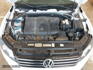 2012 Volkswagen Passat S w/Appearance with VIN 1VWAH7A35CC107902, listed as a IAAI auction lot 41243434 with 158,889 mi miles. Bid and sale history available at carsss.com. Image 10.