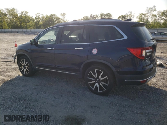 2019 Honda Pilot Touring 8-Passenger z VIN 5FNYF6H90KB000303, wystawiony jako Copart lot #52410585 z przebiegiem 129 190 mil mil oraz Szkoda całkowita • Salvage title. Historia ofert i sprzedaży dostępna na DreamBid. Obrazek 2.