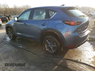 2021 Mazda CX-5 Sport with VIN JM3KFABM1M0406640, listed as a Copart auction lot 85698624 with 31,267 mi miles and Salvage Title. Bid and sale history available at carsss.com. Image 2.