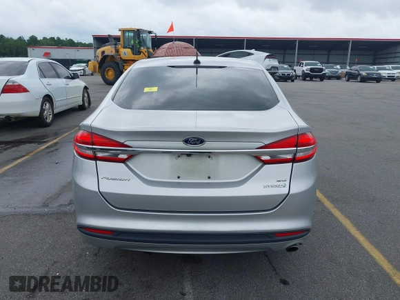 2017 Ford Fusion Hybrid SE with VIN 3FA6P0LU2HR317784, listed as a IAAI auction lot 42618554 with 114,814 mi miles and . Bid and sale history available at DreamBid. Image 17.