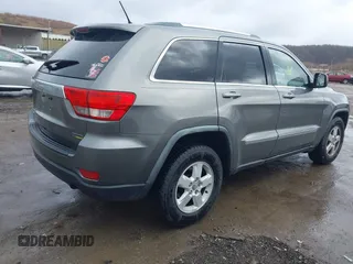 2012 Jeep Grand Cherokee Laredo with VIN 1C4RJFAGXCC118823, listed as a IAAI auction lot 41808398 with 153,509 mi miles. Bid and sale history available at carsss.com. Image 4.