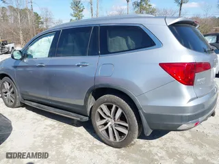 2017 Honda Pilot Touring with VIN 5FNYF6H94HB006873, listed as a IAAI auction lot 41618529 with 154,689 mi miles. Bid and sale history available at carsss.com. Image 3.
