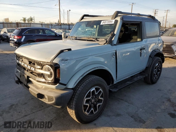 2021 Ford Bronco z VIN 1FMDE5AP0MLA98152, wystawiony jako Copart lot #84872094 z przebiegiem 10 907 mil mil oraz Szkoda całkowita • Salvage title. Historia ofert i sprzedaży dostępna na DreamBid. Obrazek 1.