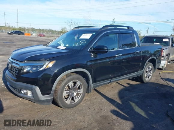2018 Honda Ridgeline RTL-E z VIN 5FPYK3F78JB013981, wystawiony jako IAAI lot #41844954 z przebiegiem 101 794 mil mil oraz . Historia ofert i sprzedaży dostępna na DreamBid. Obrazek 16.
