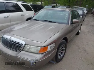 2001 Mercury Grand Marquis LS with VIN 2MEFM75W71X643239, listed as a IAAI auction lot 42048113 with 195,441 mi miles and . Bid and sale history available at DreamBid. Image 2.