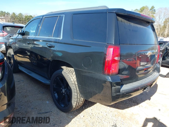 2015 Chevrolet Tahoe LT with VIN 1GNSCBKC5FR156050, listed as a IAAI auction lot 41486815 with 220,599 mi miles and . Bid and sale history available at DreamBid. Image 3.