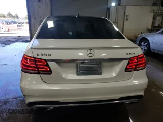 2014 Mercedes-Benz E-Class E 350 Luxury with VIN WDDHF8JB3EA928425, listed as a Copart auction lot 50696365 with 122,589 mi miles and Salvage Title. Bid and sale history available at carsss.com. Image 6.