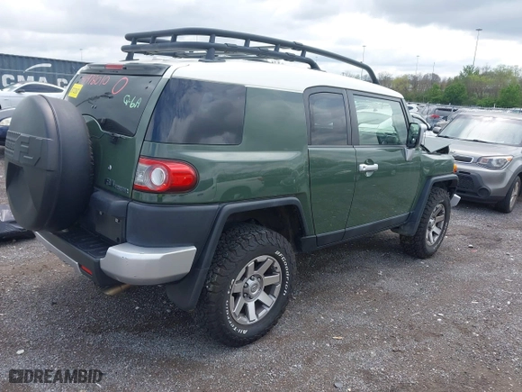 2014 Toyota FJ Cruiser with VIN JTEBU4BF1EK203587, listed as a IAAI auction lot 41978010 with 62,438 mi miles. Bid and sale history available at carsss.com. Image 4.