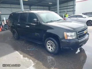 2013 Chevrolet Suburban LT with VIN 1GNSCJE06DR141176, listed as a IAAI auction lot 41603608 with 241,079 mi miles. Bid and sale history available at carsss.com. Image 1.