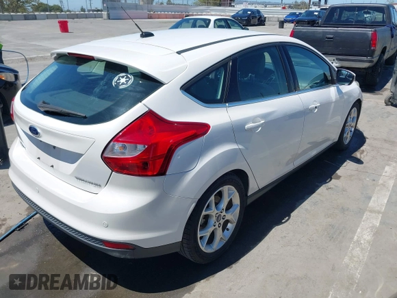 2014 Ford Focus Titanium with VIN 1FADP3N27EL330366, listed as a IAAI auction lot 42719377 with 97,009 mi miles and . Bid and sale history available at DreamBid. Image 4.