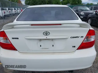 2002 Toyota Camry XLE z VIN 4T1BF30K72U500934, wystawiony jako IAAI lot #42312967 z przebiegiem 169 569 mil mil oraz . Historia ofert i sprzedaży dostępna na DreamBid. Obrazek 16.