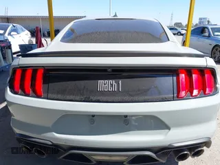2021 Ford Mustang Mach 1 with VIN 1FA6P8R08M5550536, listed as a IAAI auction lot 41664249 with 19,006 mi miles and . Bid and sale history available at DreamBid. Image 16.