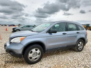 2009 Honda CR-V LX z VIN JHLRE383X9C014057, wystawiony jako Copart lot #60958385 z przebiegiem 90 099 mil mil oraz Szkoda całkowita • Salvage title. Historia ofert i sprzedaży dostępna na DreamBid. Obrazek 1.