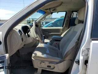 2006 Ford Explorer XLT with VIN 1FMEU63E16UB53195, listed as a Copart auction lot 62358065 with 211,283 mi miles and Salvage title. Bid and sale history available at DreamBid. Image 7.