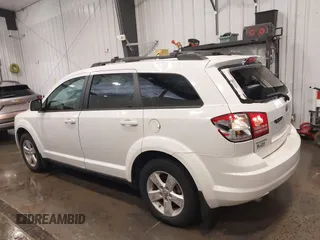 2009 Dodge Journey SXT z VIN 3D4GG57V09T582922, wystawiony jako IAAI lot #42248003 z przebiegiem 138 059 mil mil oraz . Historia ofert i sprzedaży dostępna na DreamBid. Obrazek 14.