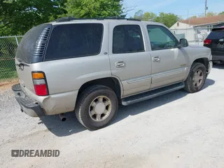 2005 GMC Yukon SLT z VIN 1GKEK13T35R127330, wystawiony jako IAAI lot #42138030 z przebiegiem 195 079 mil mil oraz . Historia ofert i sprzedaży dostępna na DreamBid. Obrazek 4.