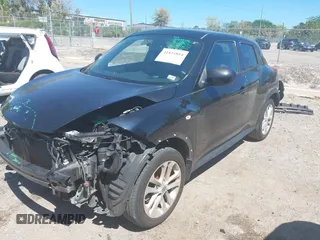 2014 Nissan Juke S with VIN JN8AF5MR1ET451280, listed as a IAAI auction lot 41821854 with 156,632 mi miles. Bid and sale history available at carsss.com. Image 2.