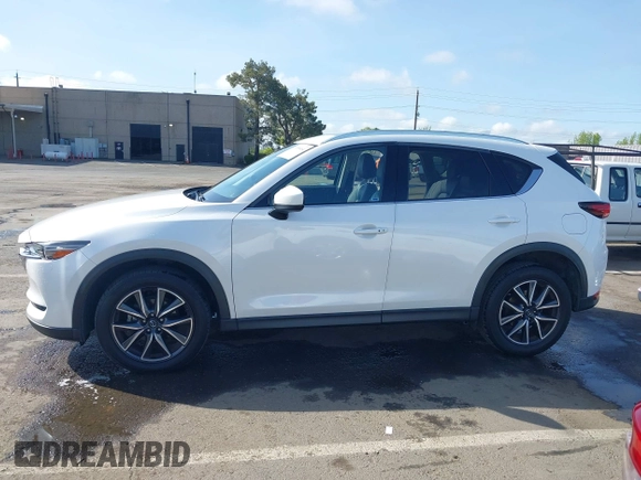 2017 Mazda CX-5 Grand Touring with VIN JM3KFADLXH0222341, listed as a IAAI auction lot 41990464 with 94,374 mi miles and . Bid and sale history available at carsss.com. Image 15.
