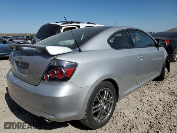 2009 Scion tC z VIN JTKDE167590296040, wystawiony jako Copart lot #58440895 z przebiegiem 171 825 mil mil oraz Szkoda całkowita • Salvage title. Historia ofert i sprzedaży dostępna na DreamBid. Obrazek 3.