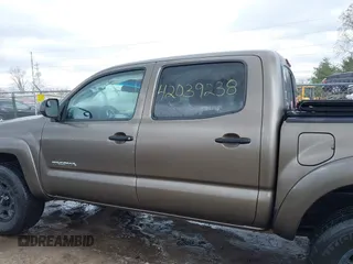 2015 Toyota Tacoma with VIN 3TMLU4EN8FM198605, listed as a IAAI auction lot 42039238 with 132,109 mi miles and . Bid and sale history available at DreamBid. Image 14.