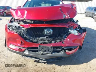 2020 Mazda CX-5 Touring with VIN JM3KFACM1L0756864, listed as a IAAI auction lot 41761131 with 16,646 mi miles and . Bid and sale history available at carsss.com. Image 6.