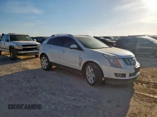2016 Cadillac SRX Performance Collection with VIN 3GYFNCE37GS573748, listed as a Copart auction lot 66300135 with 136,619 mi miles and Salvage title. Bid and sale history available at DreamBid. Image 4.