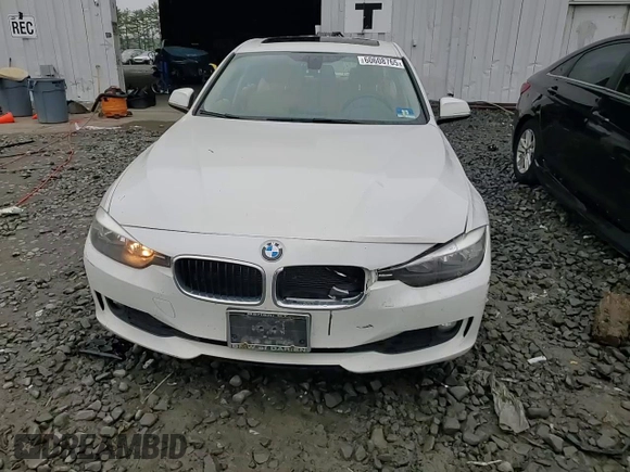 2014 BMW 3 Series 320i xDrive with VIN WBA3C3C51EF983592, listed as a Copart auction lot 60608765 with 195,061 mi miles and Salvage title. Bid and sale history available at DreamBid. Image 13.