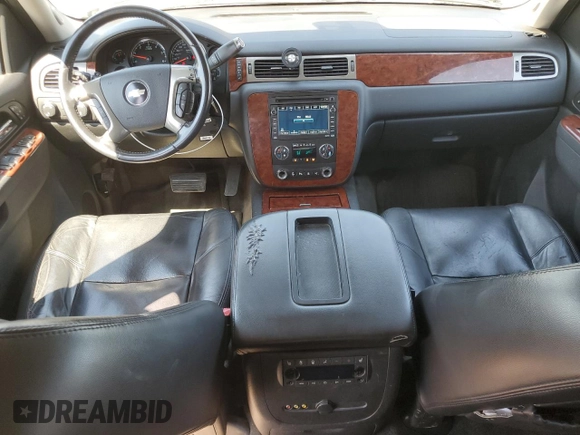 2010 Chevrolet Tahoe LTZ with VIN 1GNUKCE08AR117979, listed as a Copart auction lot 64802225 with 228,769 mi miles and Salvage title. Bid and sale history available at DreamBid. Image 8.