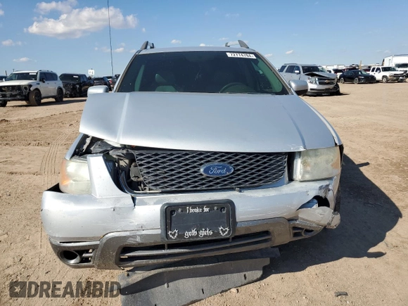 2005 Ford Freestyle SEL z VIN 1FMDK02135GA10159, wystawiony jako Copart lot #72774784 z przebiegiem 146 096 mil mil oraz Szkoda całkowita • Salvage title. Historia ofert i sprzedaży dostępna na DreamBid. Obrazek 5.