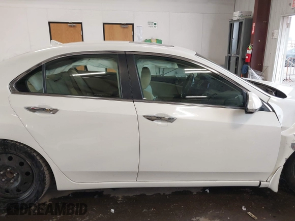 2010 Acura TSX with VIN JH4CU2F61AC043558, listed as a IAAI auction lot 41724293 with 82,036 mi miles. Bid and sale history available at carsss.com. Image 14.
