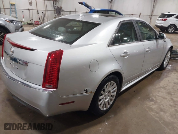 2011 Cadillac CTS Luxury with VIN 1G6DG5EYXB0159302, listed as a IAAI auction lot 41781354 with 71,069 mi miles and . Bid and sale history available at carsss.com. Image 4.