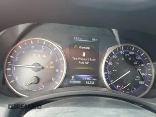 2015 Infiniti Q50 Sport with VIN JN1BV7AP2FM338924, listed as a Copart auction lot 64821585 with 104,907 mi miles and Clean title. Bid and sale history available at DreamBid. Image 9.