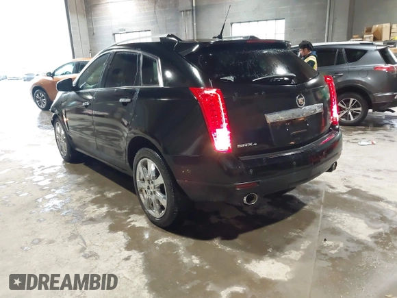 2012 Cadillac SRX Performance Collection z VIN 3GYFNEE37CS630391, wystawiony jako IAAI lot #42280516 z przebiegiem 137 330 mil mil oraz . Historia ofert i sprzedaży dostępna na DreamBid. Obrazek 3.